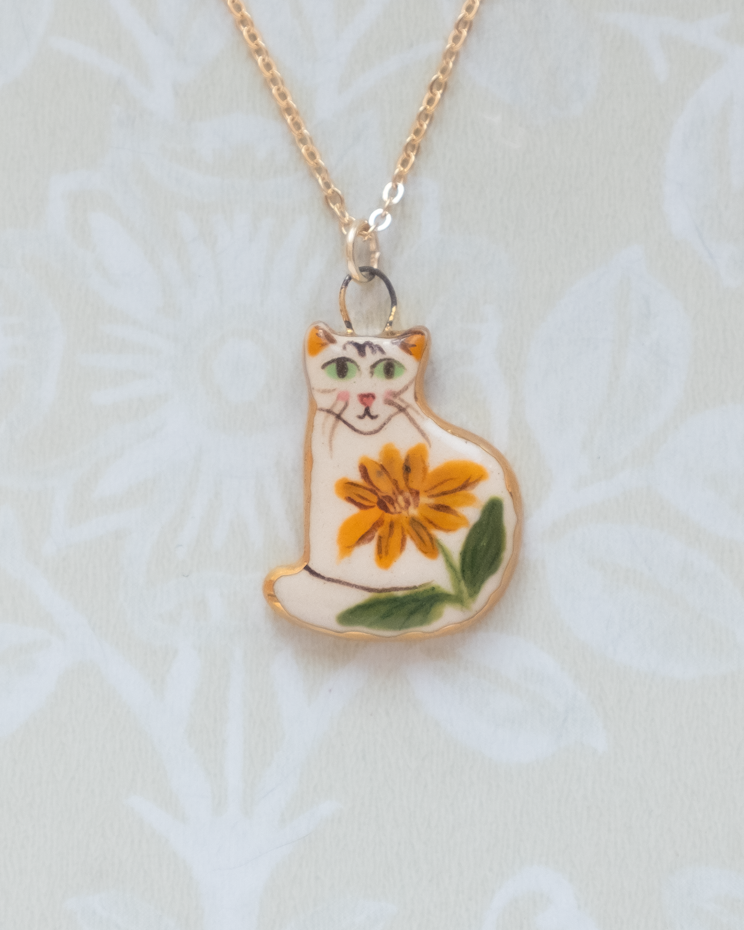 Orange Flower Cat Charm